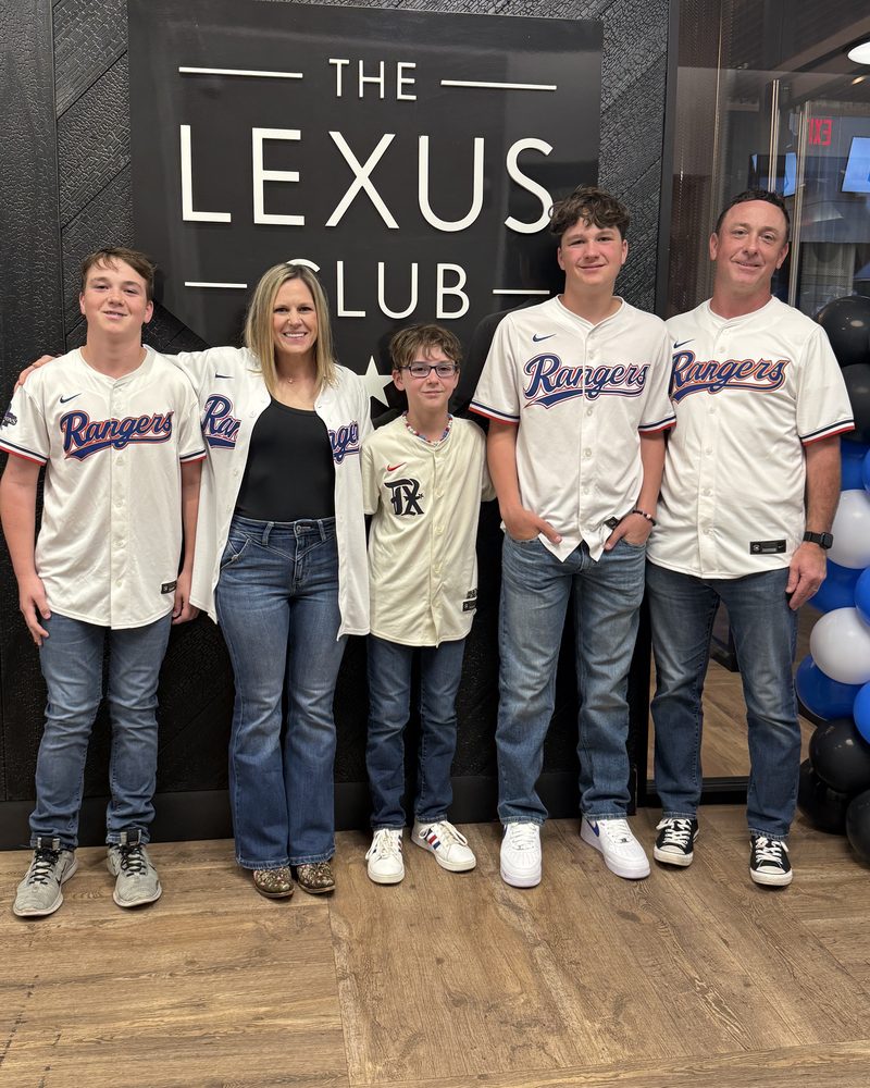 Jim with his family in Texas Rangers jerseys